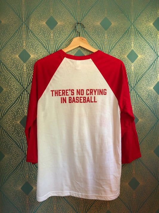 The back of a Red/White baseball shirt with the words 'there's no crying in baseball' written on it